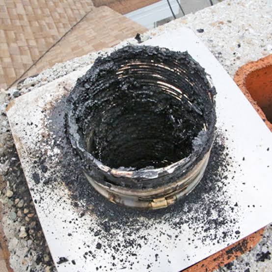 Heavy creosote buildup inside a chimney flue